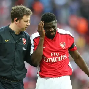 Arsenal physio Colin Lewin with Kolo Toure Arsenal physio Colin Lewin with Kolo Toure
