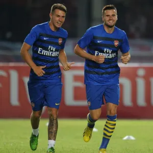 Arsenal Players Aaron Ramsey and Carl Jenkinson Warm Up Ahead of Indonesia All-Stars Match