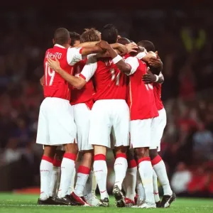 The Arsenal players celebrate the 2nd goal scored by Alex Hleb