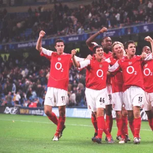 The Arsenal players celebrate the 2nd goal scored by Danny Karbassiyoon