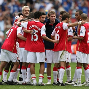 The Arsenal players celebrate after the match