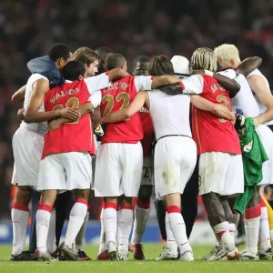 Arsenal players form a huddle at the end of the match Arsenal players form a huddle at the end of the match