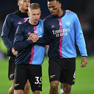 Arsenal Players Gabriel Magalhaes and Oleksandr Zinchenko Warm Up Ahead of Brighton & Hove Albion Clash (Premier League 2022-23)
