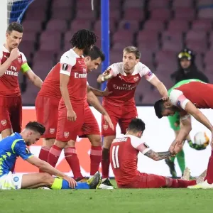 Arsenal Players Gather for Pre-Match Huddle against Napoli in Europa League Quarterfinal