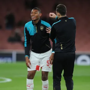 Arsenal Players Jeff Reine-Adelaide and Gabriel: A Light-Hearted Moment During Arsenal v Dinamo Zagreb Warm-Up, UEFA Champions League, 2015 Arsenal Players Jeff Reine-Adelaide and Gabriel: A Light-Hearted Moment During Arsenal v Dinamo Zagreb Warm-Up, UEFA Champions League, 2015