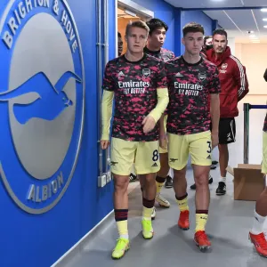 Arsenal Players Kieran Tierney and Martin Odegaard Warm Up Ahead of Brighton & Hove Albion Clash