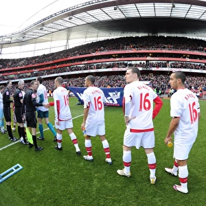 Arsenal players line up before the match wearing Aaron Ramsey shirts. Arsenal 3: 1 Burnley