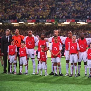 The Arsenal players and Manager Arsene Wenger line up before the match The Arsenal players and Manager Arsene Wenger line up before the match