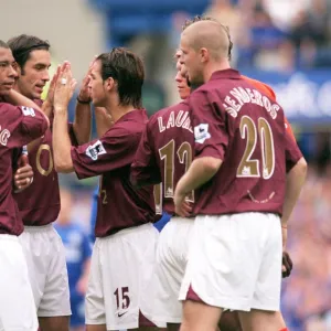 Arsenal players before the match (L>R) Gilberto, Robert Pires, Cesc Fabregas