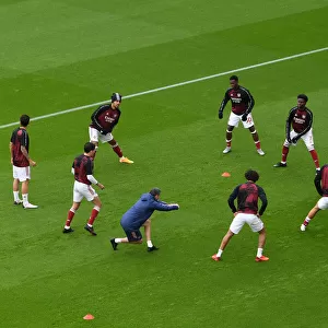 Arsenal Players Warm Up Ahead of Arsenal v Sheffield United in 2020-21 Premier League
