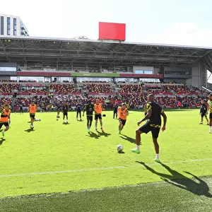 Arsenal Players Warm Up Ahead of Brentford Clash in 2022-23 Premier League