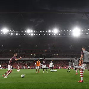 Arsenal Players Warm Up Ahead of Carabao Cup Clash Against AFC Wimbledon