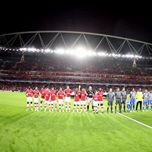 Arsenal and Porto teams line up before the match