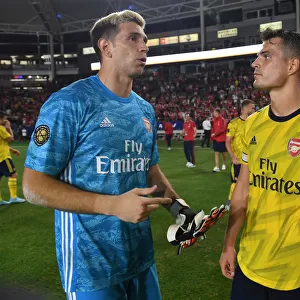 Arsenal Pre-Season: Emi Martinez and Granit Xhaka Connect Amidst Bayern Munich Rivalry