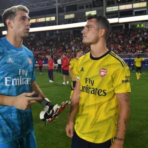 Arsenal Pre-Season: Emi Martinez and Granit Xhaka Connect Amidst Bayern Munich Rivalry