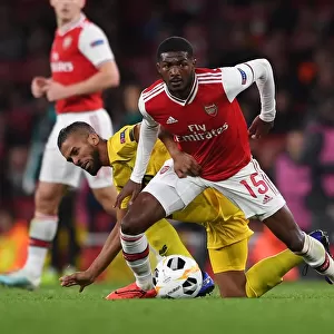 Arsenal Under Pressure: A Battle of Wits - Maitland-Niles vs. Carcela