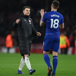 Arsenal Rivals Turned Teammates: Ramsey and Giroud's Unity After Intense Arsenal vs. Chelsea Clash (2018-19)