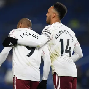 Arsenal Stars Lacazette and Aubameyang Celebrate Goal in Brighton Victory