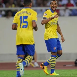 Arsenal Stars: Oxlade-Chamberlain Scores, Walcott Celebrates in Vietnam Friendly, 2013 Arsenal Stars: Oxlade-Chamberlain Scores, Walcott Celebrates in Vietnam Friendly, 2013