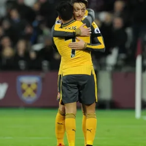 Arsenal Stars: Ozil and Sanchez Celebrate Goal vs. West Ham United, 2016-17 Arsenal Stars: Ozil and Sanchez Celebrate Goal vs. West Ham United, 2016-17