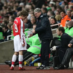 Arsenal substitute Jack Wilshere talks with assistant
