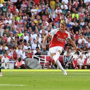 Arsenal Takes the Lead: Martin Ødegaard Scores First Goal Against Manchester United (2023-24)