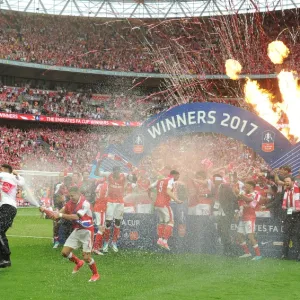 The Arsenal team celebrate with the traophy after the match. Arsenal 2: 1 Chelsea