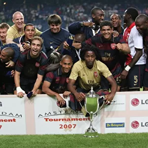 The Arsenal team celebrate winning the Amsterdam tournament