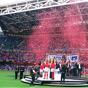 The Arsenal team celebrate after winning the FA Cup