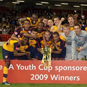 The Arsenal team celebrate winning the youth cup