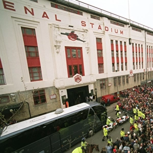 The Arsenal Team coach drops the players at the East Stand on Avenell Road