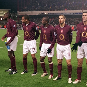 The Arsenal team lines up before the match