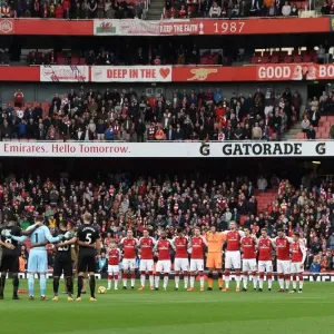 The Arsenal team have a minutes silence before the match. Arsenal 2: 1 Swansea City The Arsenal team have a minutes silence before the match. Arsenal 2: 1 Swansea City