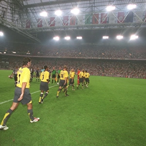 The Arsenal team walk out onto the pitch. Ajax 0: 1 Arsenal