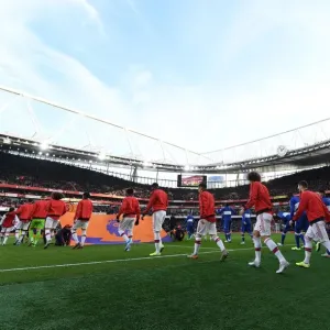 Arsenal team walks out before the match Arsenal team walks out before the match
