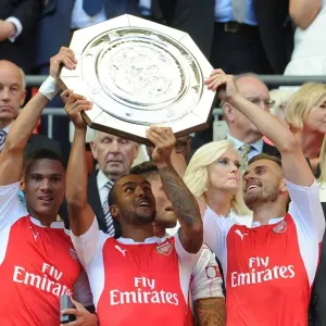 Arsenal Triumph Print: Gibbs, Walcott, Ramsey Lift Community Shield Arsenal Triumph Print: Gibbs, Walcott, Ramsey Lift Community Shield