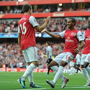 Arsenal Triumph: Walcott, Gervinho, Ramsey Celebrate Goal vs Udinese in 2011-12 Champions League