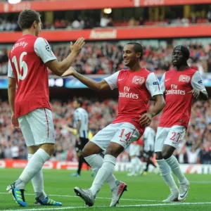 Arsenal Triumph: Walcott, Gervinho, Ramsey Celebrate Goal vs Udinese in 2011-12 Champions League