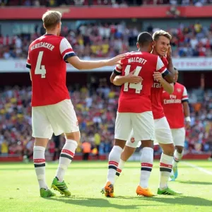 Arsenal Triumph: Walcott, Mertesacker, Ramsey - Celebrating a Goal against Galatasaray (2013-14)