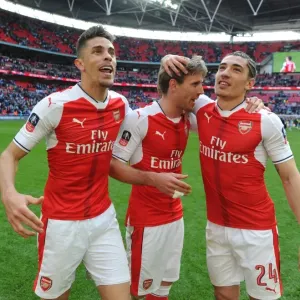 Arsenal Triumphs in FA Cup Semi-Final: Gabriel, Monreal, and Bellerin Celebrate