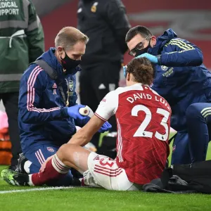 Arsenal v Wolverhampton Wanderers: David Luiz Receives Treatment Amidst Empty Emirates Stadium (2020-21) Arsenal v Wolverhampton Wanderers: David Luiz Receives Treatment Amidst Empty Emirates Stadium (2020-21)