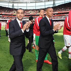 Arsenal Victory: Walcott and Gibbs Celebrate Over West Bromwich Albion (2013-14)