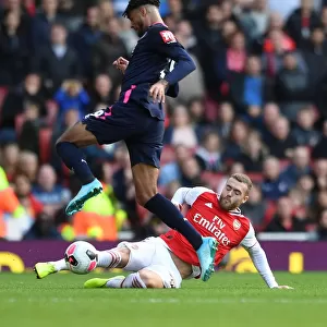 Arsenal vs. AFC Bournemouth: Calum Chambers Tackles Philip Billings in Premier League Clash