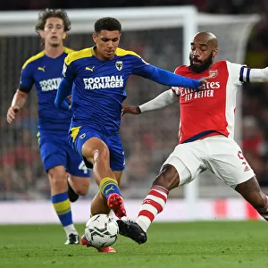 Arsenal vs AFC Wimbledon: Lacazette Clashes with Lawrence in Carabao Cup Showdown