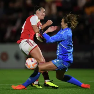 Arsenal vs. Ajax: A Clash in the UEFA Women's Champions League - Caitlin Foord and Lize Kop Collide