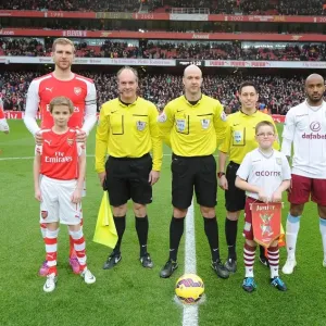 Arsenal vs. Aston Villa: Premier League Clash - Per Mertesacker and Fabian Delph Lead Teams Out at Emirates Stadium