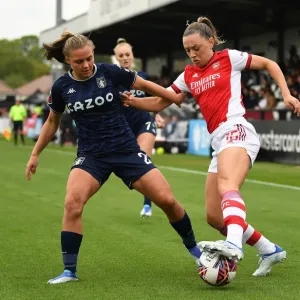 Arsenal vs Aston Villa: Women's Super League Clash - McCabe Fights for Possession Arsenal vs Aston Villa: Women's Super League Clash - McCabe Fights for Possession