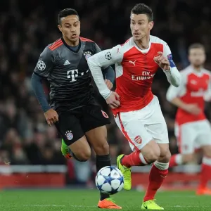 Arsenal vs. Bayern Munich: Laurent Koscielny vs. Thiago Alcantara - UEFA Champions League Showdown Arsenal vs. Bayern Munich: Laurent Koscielny vs. Thiago Alcantara - UEFA Champions League Showdown