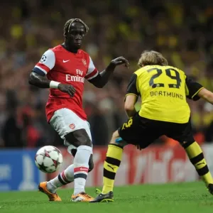 Arsenal vs. Borussia Dortmund: Clash of Sagna and Schelzer in the 2013-14 UEFA Champions League