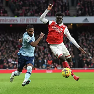 Arsenal vs Brentford: Bukayo Saka Faces Off Against Rico Henry